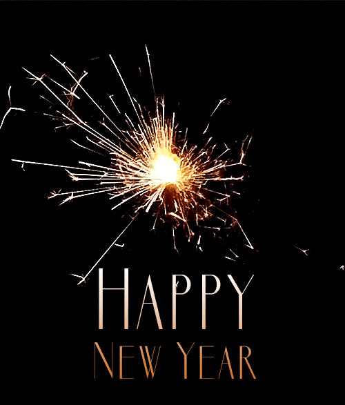 Happy new year gold sparkler firework gif
