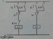 محركين بحيث لا يمكن أن يعمل K1M مع K2M: