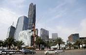 File photo: cars drive past the king abdullah financial district, north of riyadh